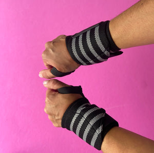 Muñequeras Negro con fucsia